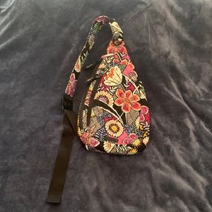 Vera Bradley Mini Sling Backpack in Kauai Floral Pattern.